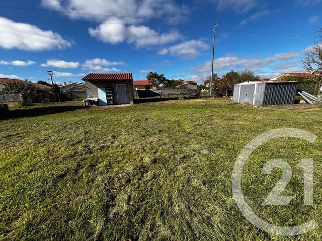 Afficher la photo en grand terrain à vendre - 500.0 m2 - LAGARDELLE SUR LEZE - 31 - MIDI-PYRENEES - Century 21 Lacroix Immobilier