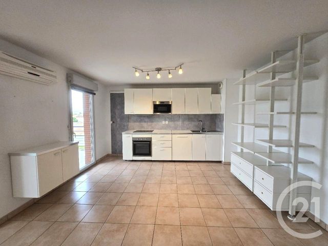 Appartement T3 à louer - 3 pièces - 64.55 m2 - PORTET SUR GARONNE - 31 - MIDI-PYRENEES - Century 21 Lacroix Immobilier